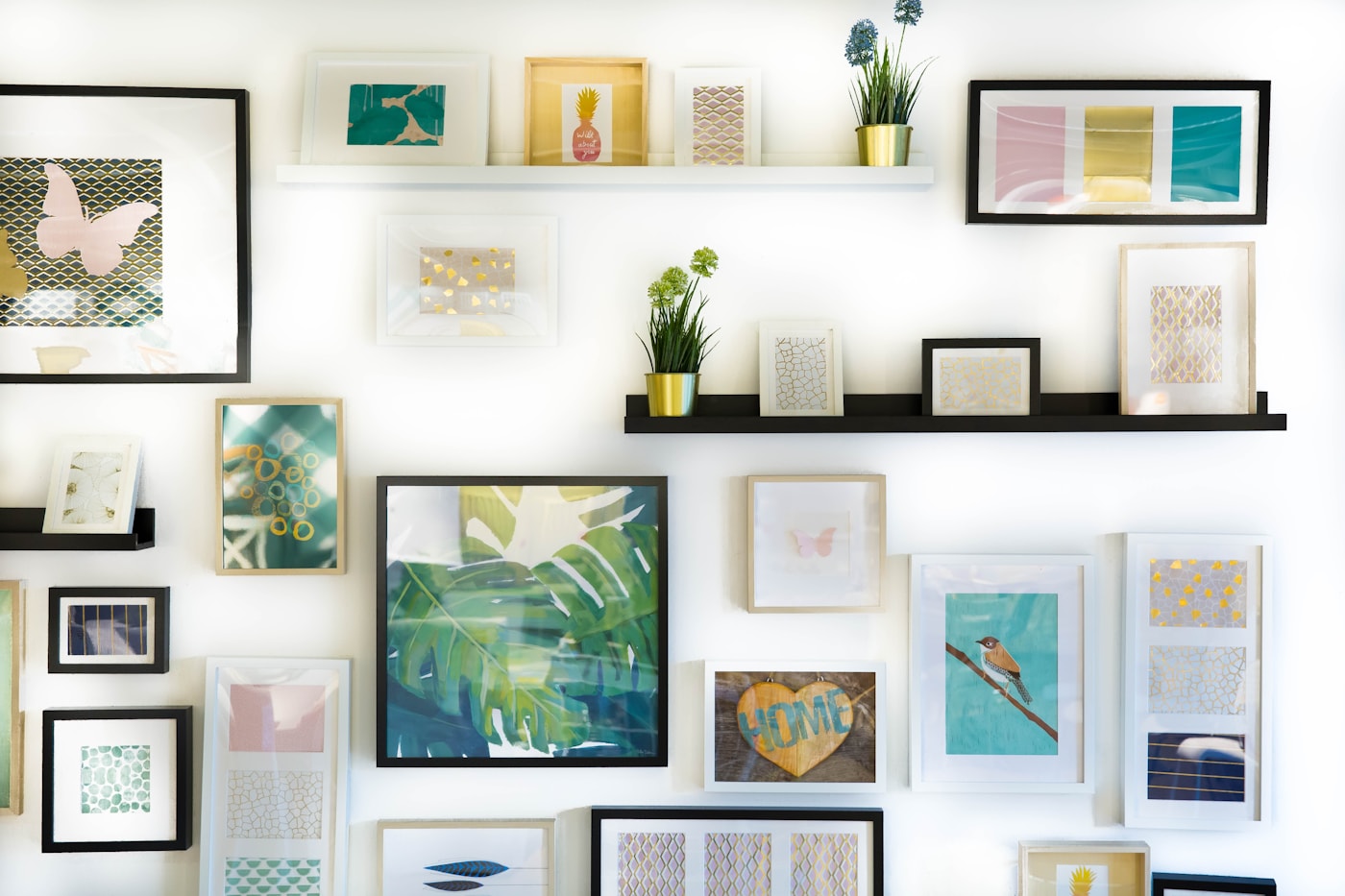 Modern wall arrangement used to judge an acrylic sign's scale, reflections, and room fit
